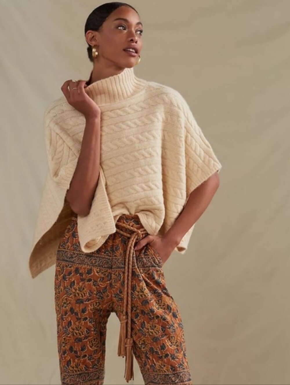 Anthropologie cream cable-knit turtleneck poncho